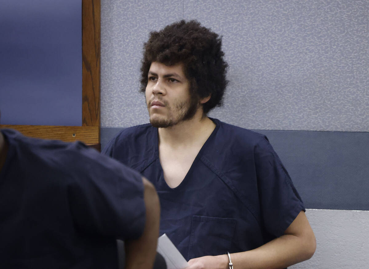 Adrian Bailey, who is accused of killing his mother and father on Saturday, appears in court du ...