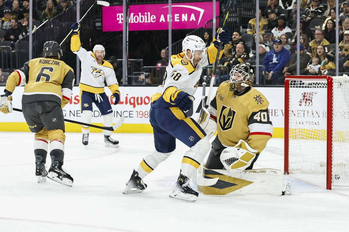 Nashville Predators left wing Michael Bunting (58) scores a goal against Golden Knights goalten ...