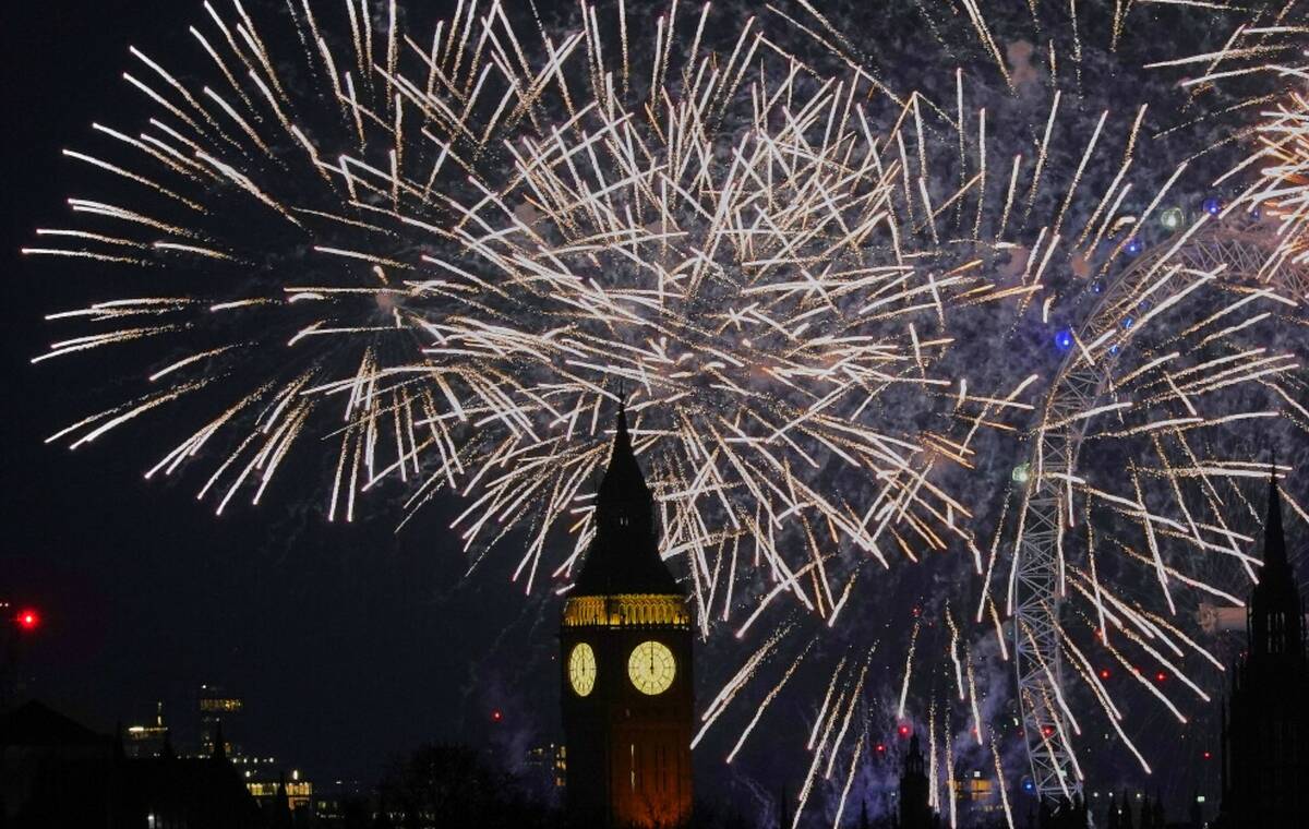 Fireworks light-up the sky in central London to celebrate the New Year on Thursday, Jan. 1, 202 ...