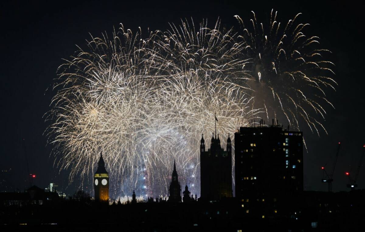 Fireworks light-up the sky in central London to celebrate the New Year on Thursday, Jan. 1, 202 ...