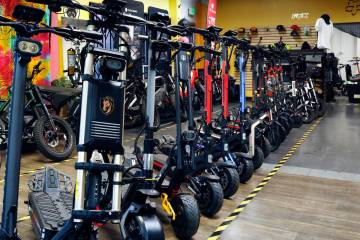 A line of e-scooters is seen at WheelZen Rides in Las Vegas on Thursday, Dec. 11, 2025. (Bizuay ...