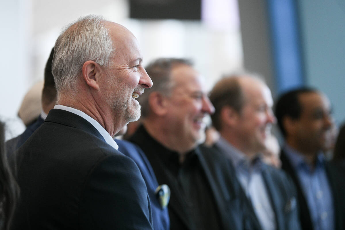 LVCVA President and CEO Steve Hill poses for photos with others during the official opening of ...