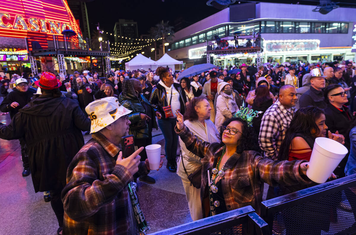 Nancy Valencia, right, of Amarillo, Texas, dances with her husband Gabriel Valencia as New Year ...
