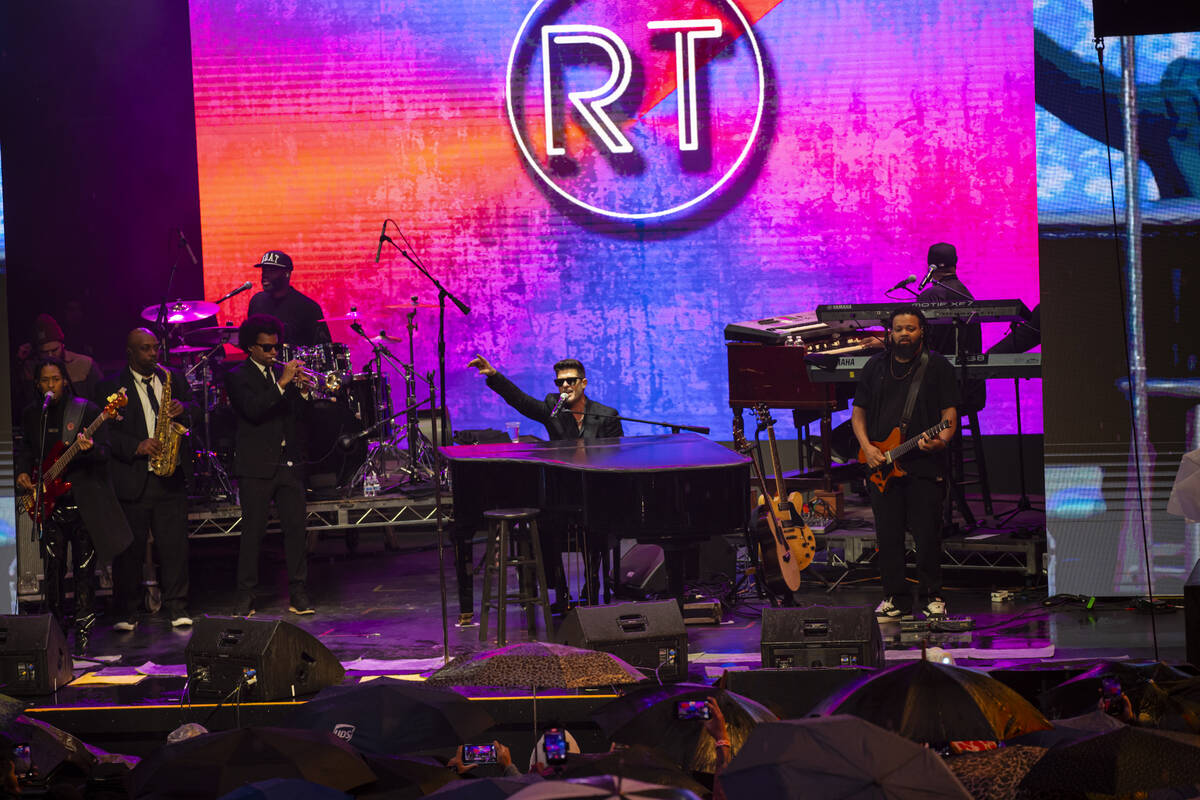 Robin Thicke performs for New Year's revelers at the Fremont Street Experience on Wednesda ...