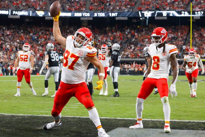 Kansas City Chiefs tight end Travis Kelce (87) spikes the ball after scoring a touchdown during ...