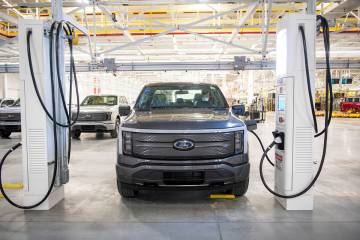 An assembled Ford F-150 Lightning is charged up at the Ford Rouge Electric Vehicle Center, in D ...
