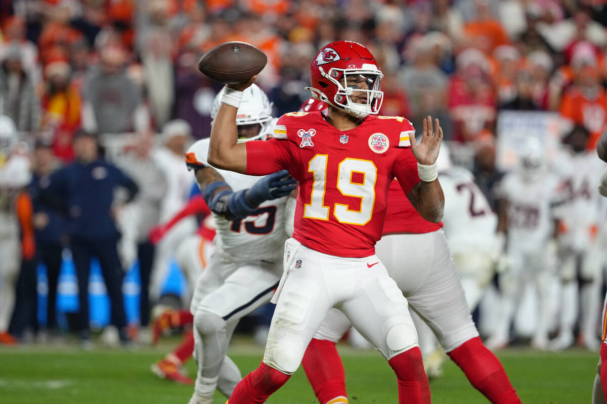 Kansas City Chiefs quarterback Chris Oladokun passes during an NFL football game against the De ...