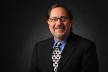 Bill Bradley, sports editor, poses for a portrait at the Las Vegas Review-Journal photos studio ...