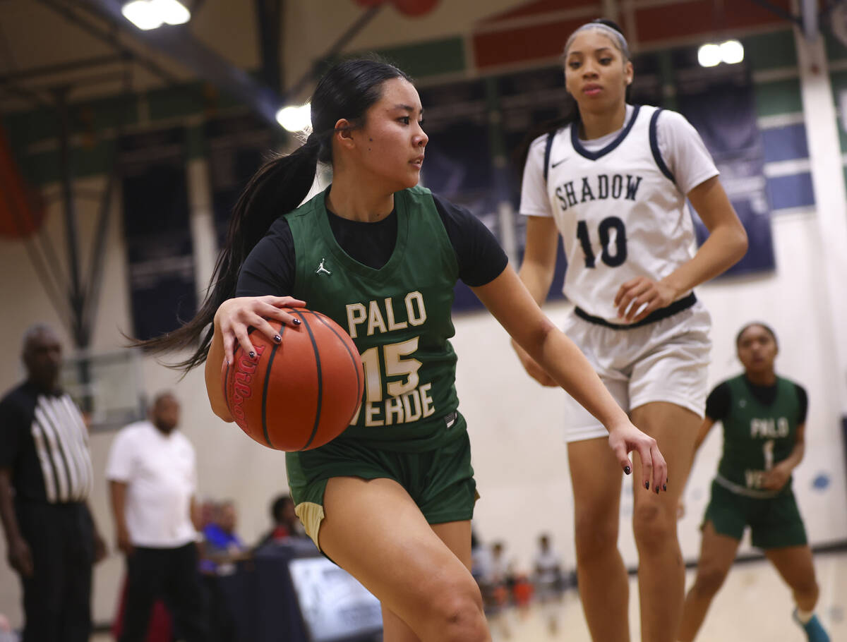Palo Verde’s Madeline Tsui (15) drives the ball as Shadow Ridge forward Jaslyn Jefferson ...