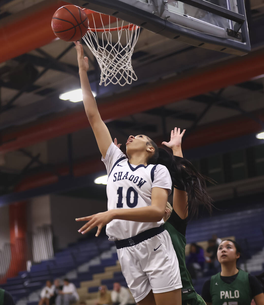 Shadow Ridge forward Jaslyn Jefferson lays up the ball against Palo Verde during a basketball g ...