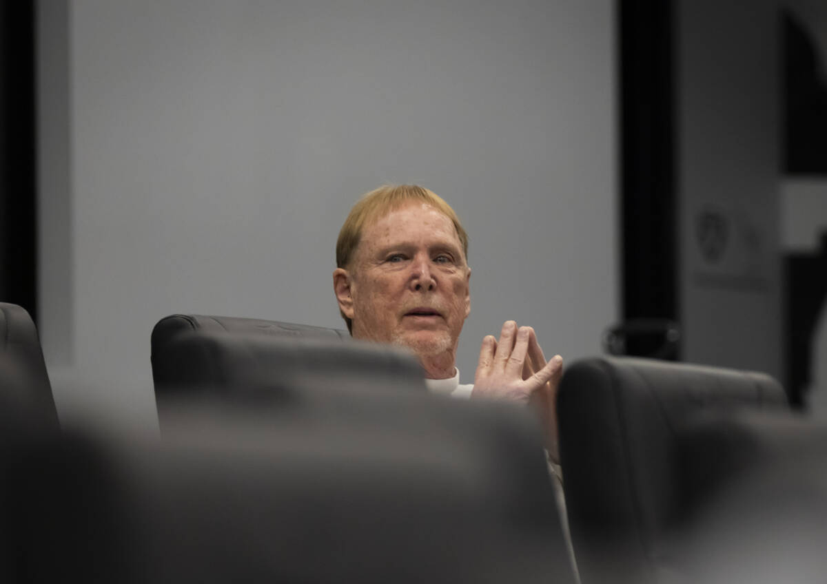 Raiders owner Mark Davis looks on before the start of a press conference with general manager J ...