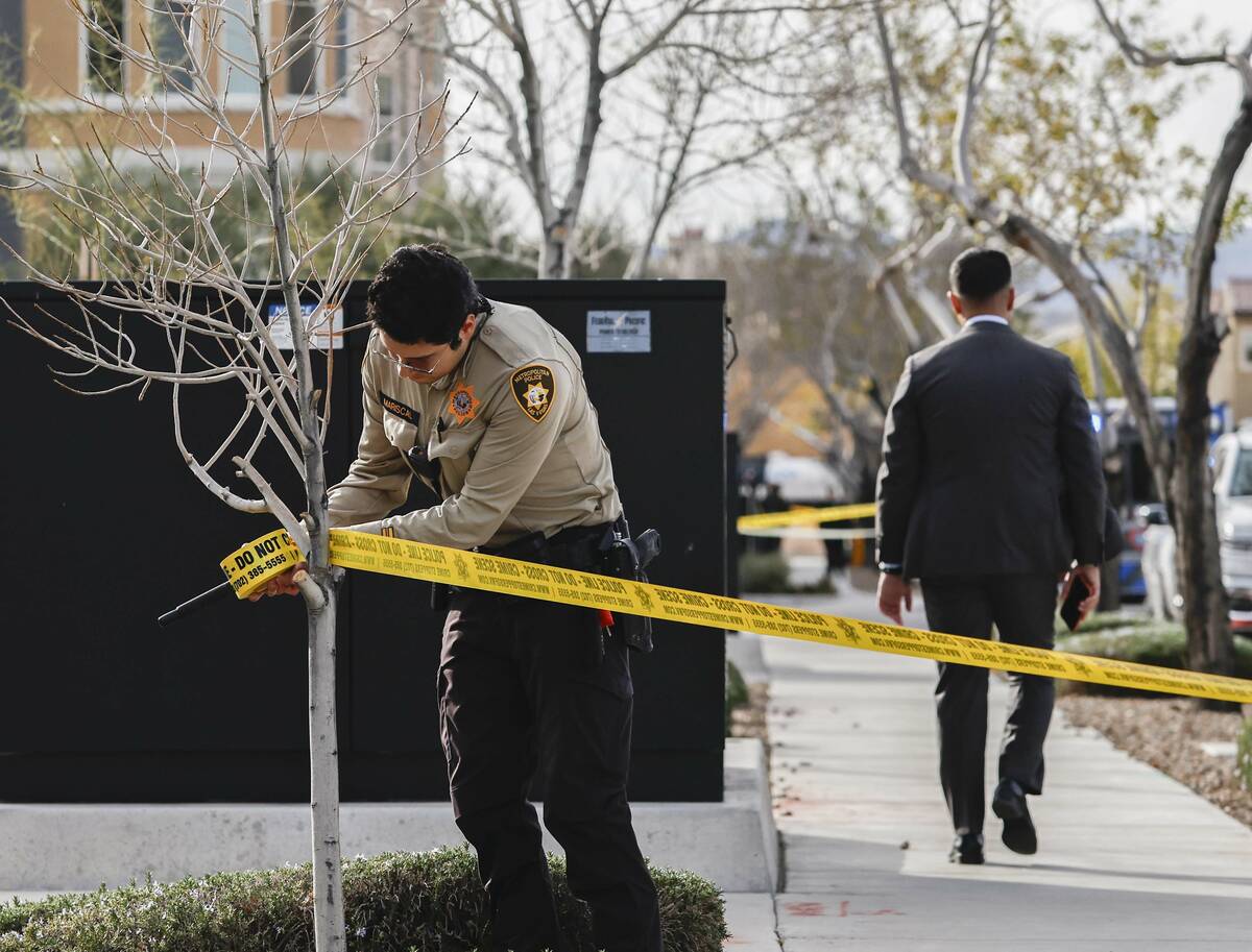 Las Vegas police investigate an officer involved shooting near South Rocky Hill Road and West R ...