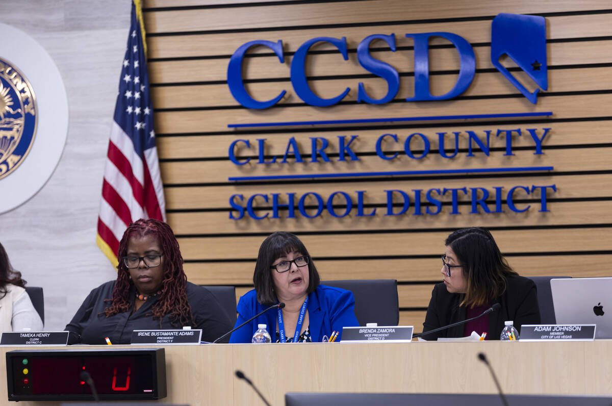 Current Clark County School Board President Irene Bustamante Adams, center, speaks before the e ...