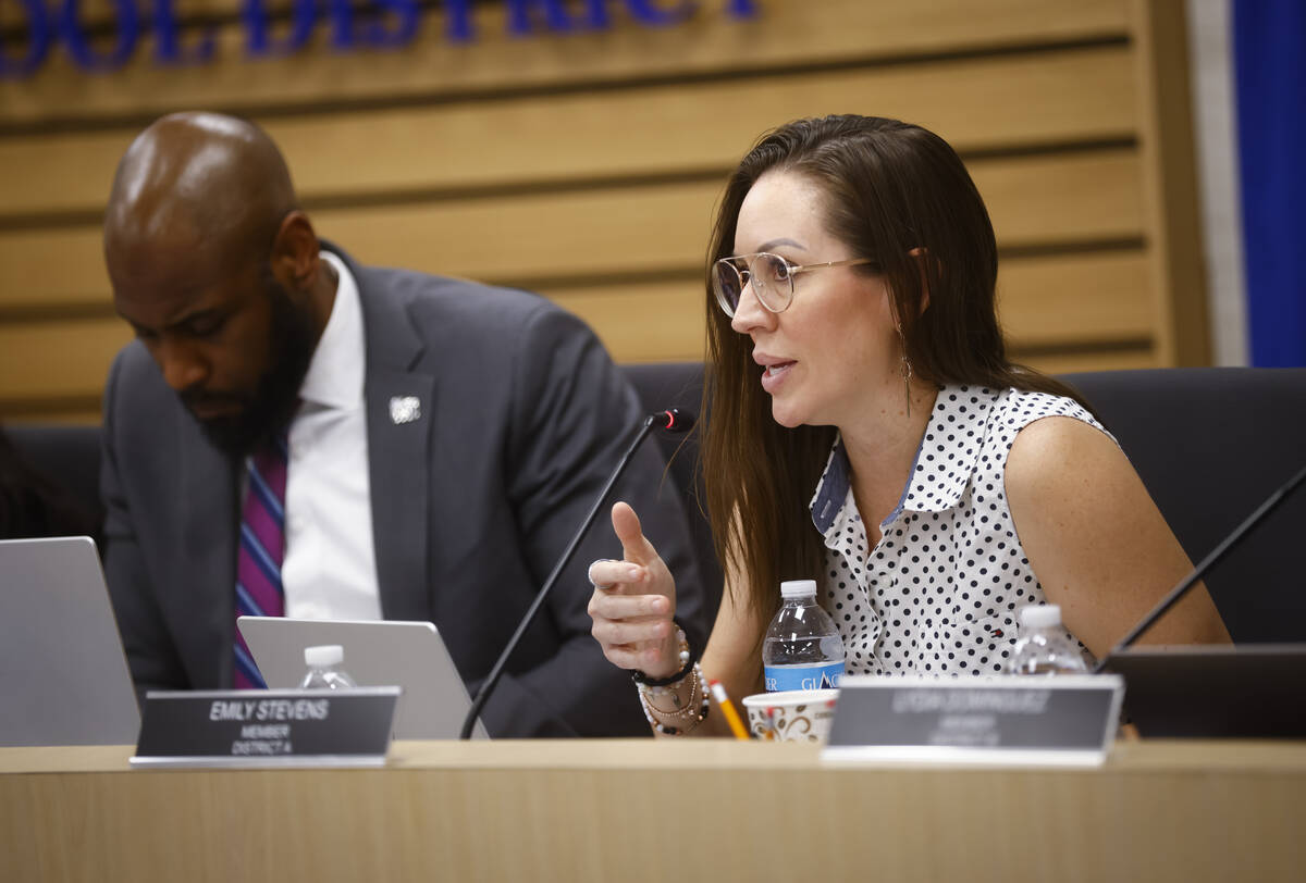 Trustee Emily Stevens asks a question of Ben Shuldiner, superintendent of Lansing School Distri ...