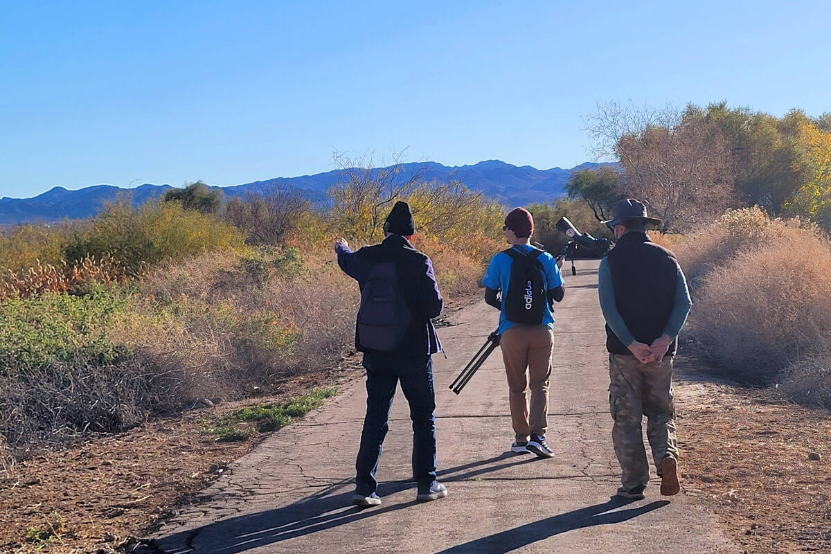 Birders walk the trails of the Henderson Bird Viewing Preserve in December. (Natalie Burt)