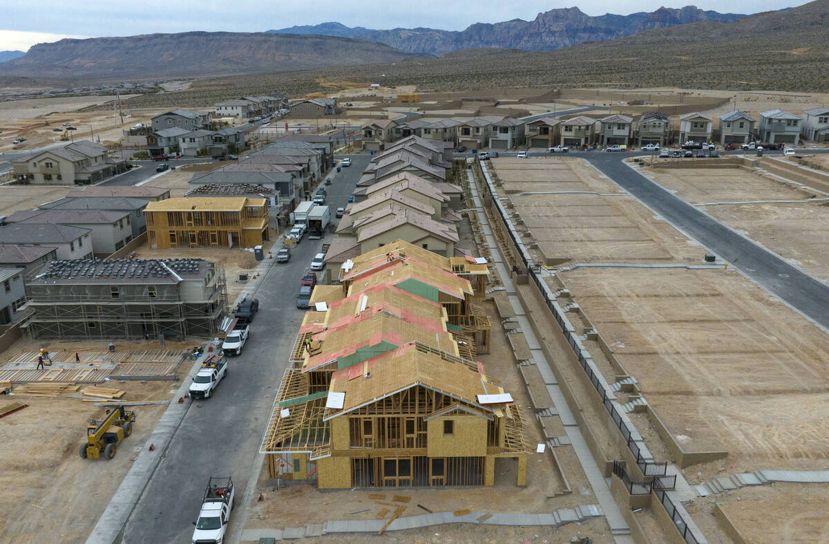 Homes under construction at the corner of Sky Vista Drive and Far Hills Avenue in Las Vegas' Su ...
