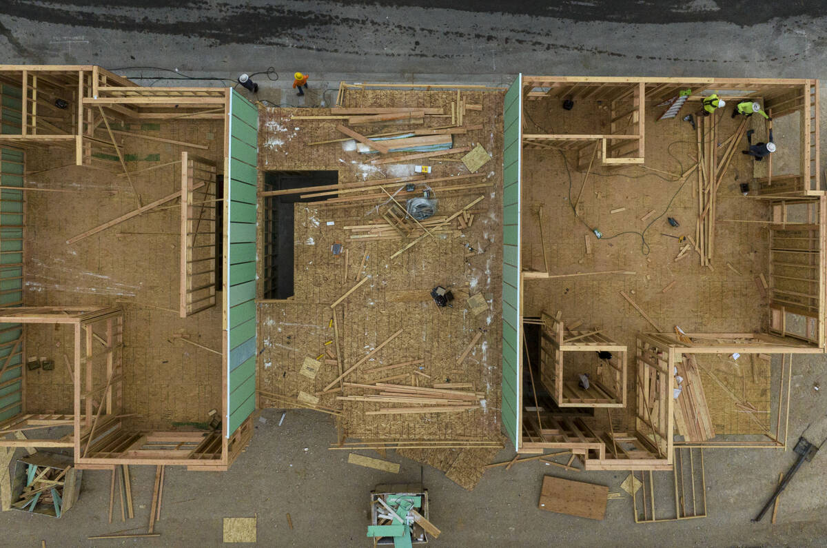 Homes under construction at the corner of Sky Vista Drive and Far Hills Avenue in Las Vegas' Su ...