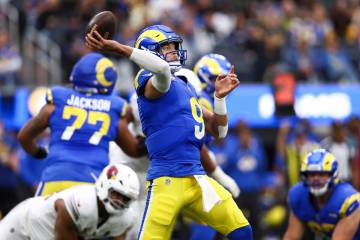 Los Angeles Rams quarterback Matthew Stafford (9) throws during the first half of an NFL footba ...