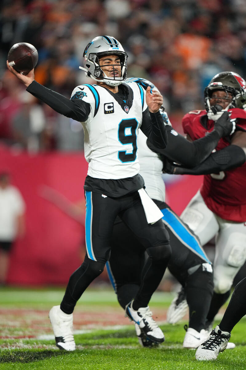 Carolina Panthers quarterback Bryce Young (9) makes a pass attempt during an NFL football game ...