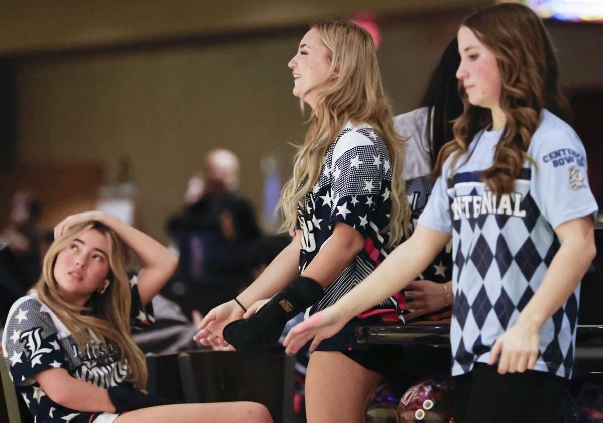 Liberty’s Sophia Medellin, middle, competes in a Class 5A bowling match Friday, Jan. 9, ...