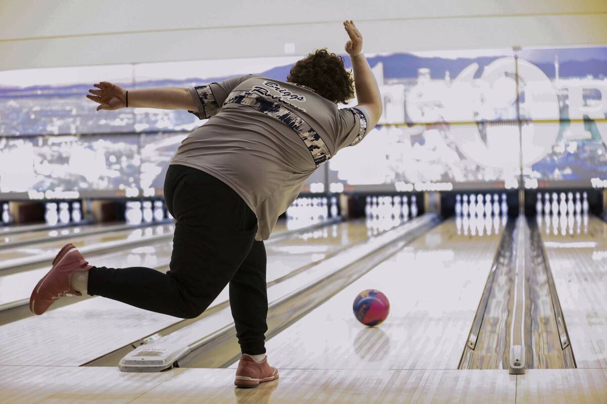 Shadow Ridge’s Briggs Robison competes in a Class 5A bowling match Friday, Jan. 9, 2026 ...