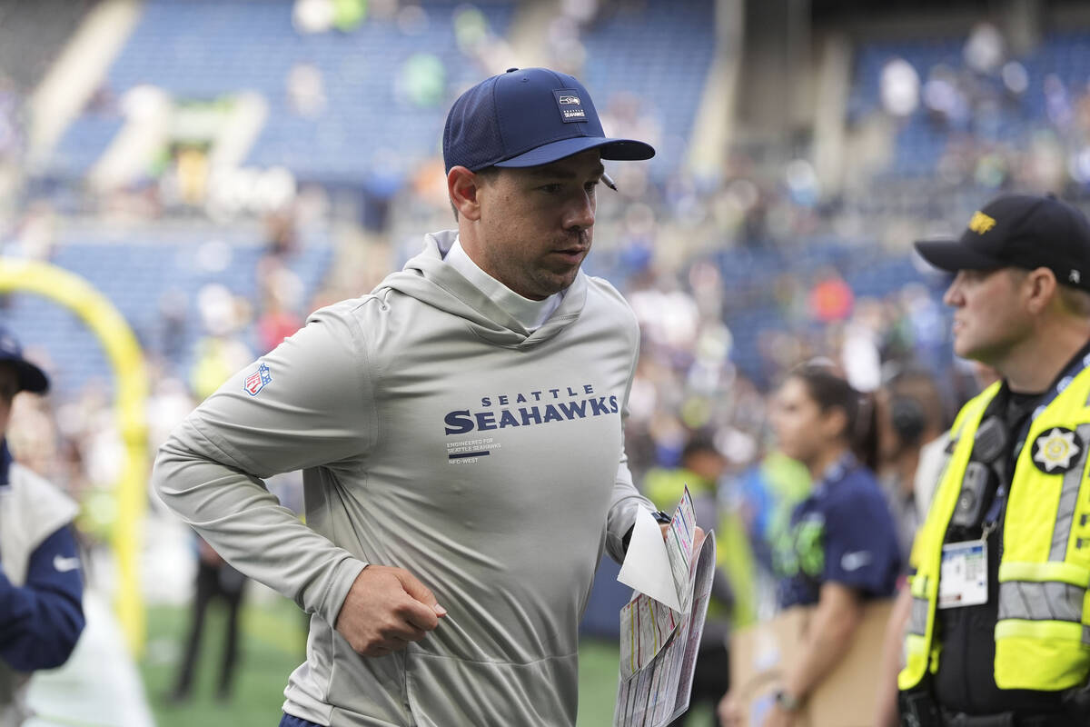 Seattle Seahawks offensive coordinator Klint Kubiak runs off the field after a win over the New ...