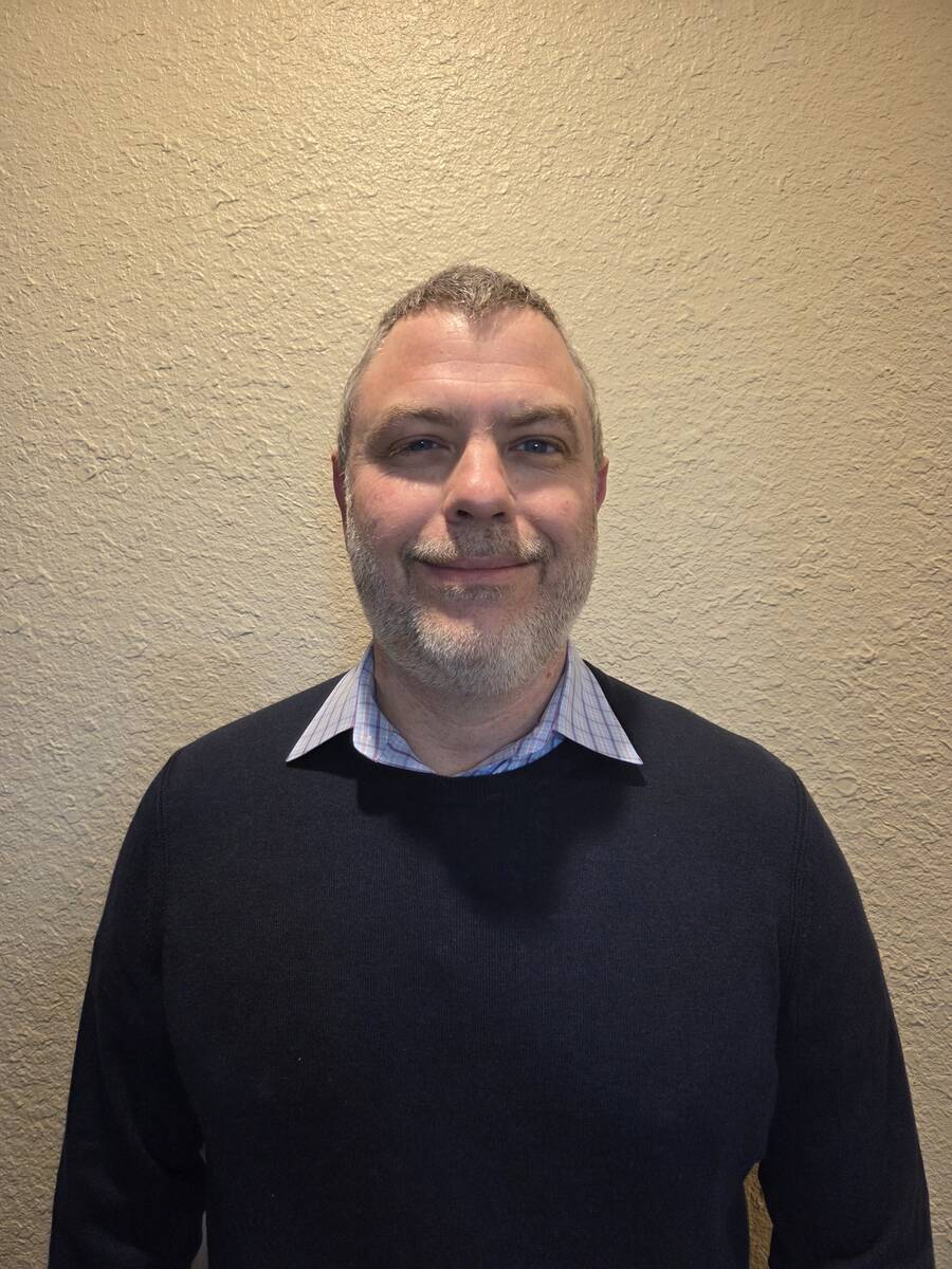 Henderson resident Bryan Boren, 46, went 61-28-1 against the spread to win the Westgate SuperCo ...