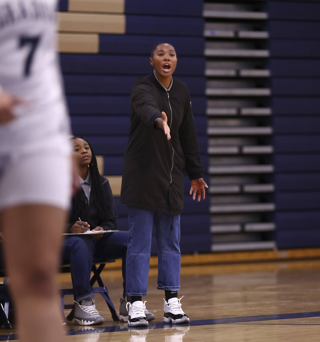 Mojave coach Sequoia Holmes motions to her team during a basketball game at Shadow Ridge High S ...