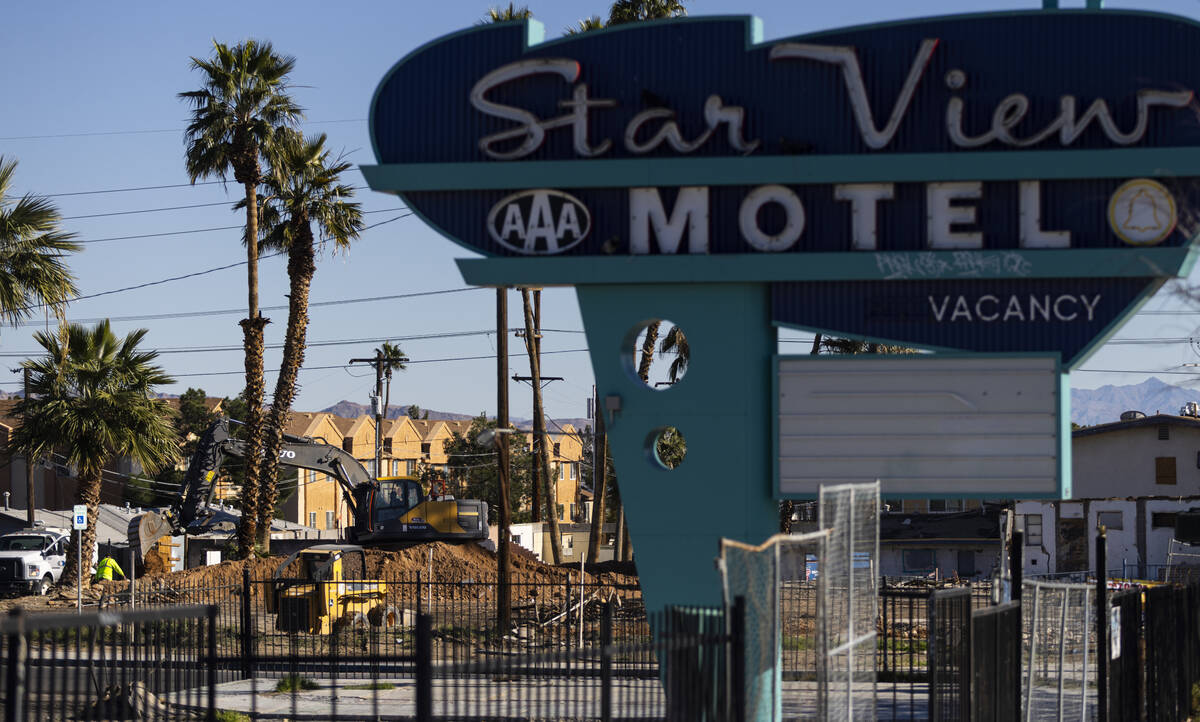 A construction crew works to demolish the former Gables Motel, which opened as Las Gables Court ...