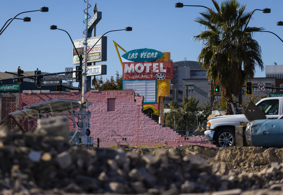 The sign for the Las Vegas Motel, which dates back to 1944, is seen from the rubble of nearby d ...