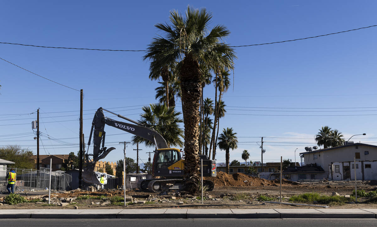 A construction crew works to demolish the former Gables Motel, which opened as Las Gables Court ...