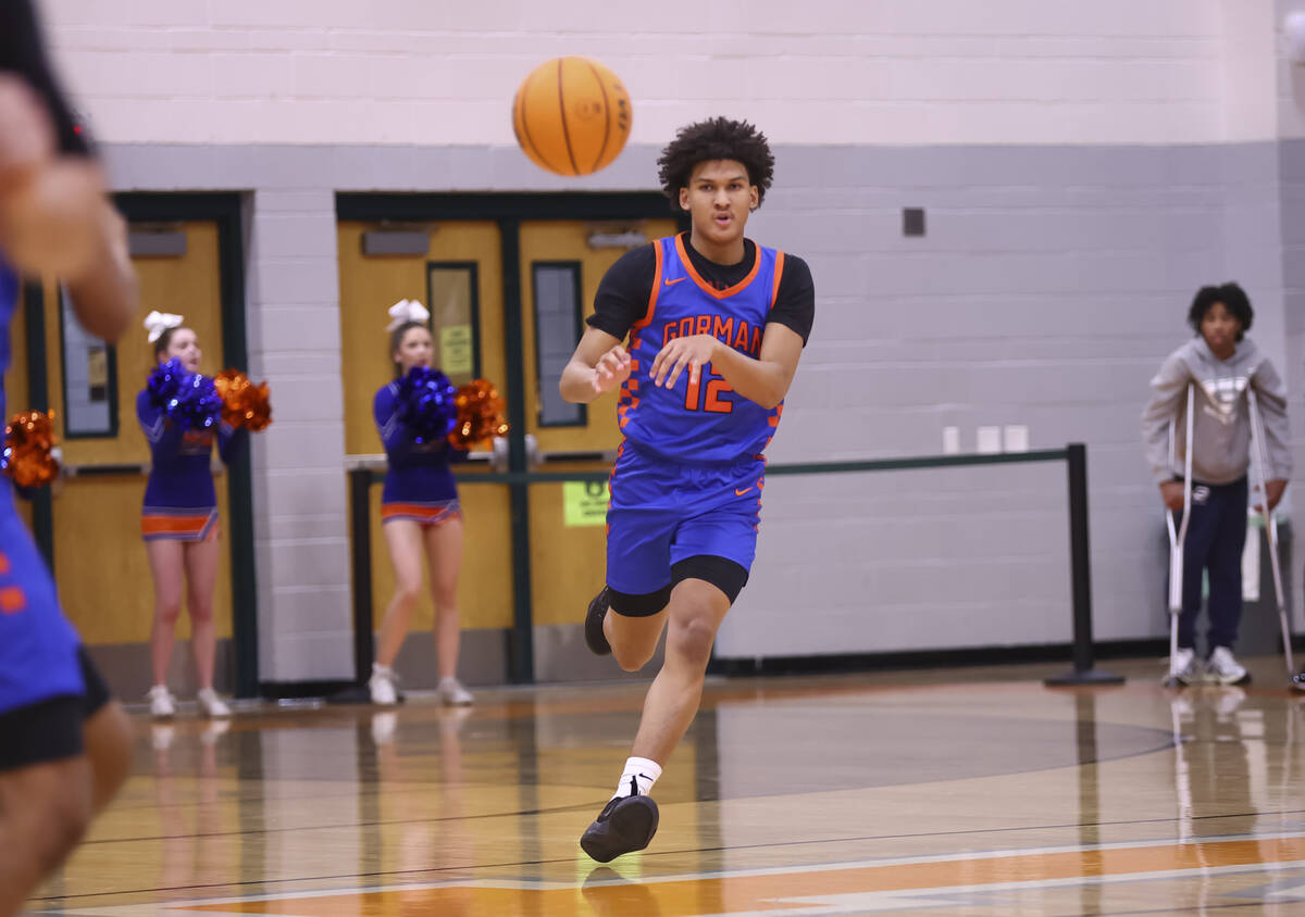 Bishop Gorman forward Braylen Williams (12) passes the ball during a basketball game at Mojave ...