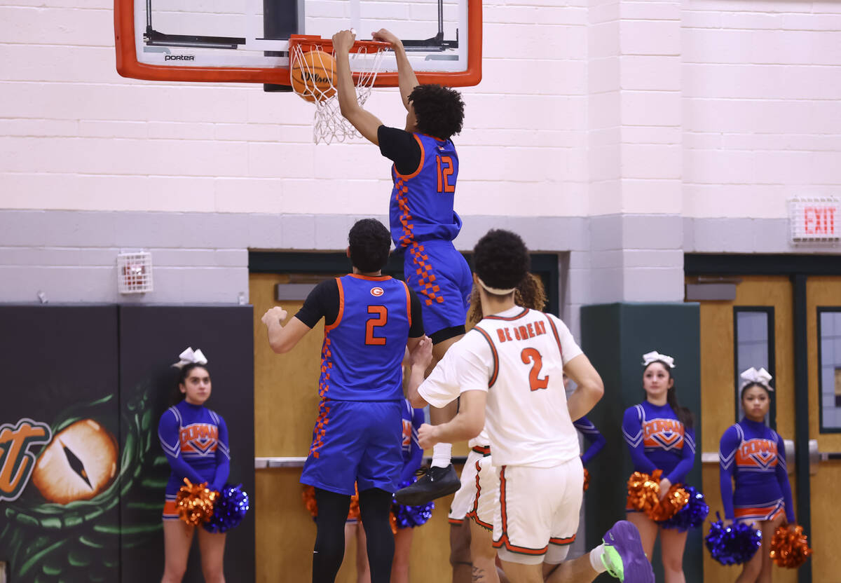 Bishop Gorman forward Braylen Williams (12) dunks the ball during a basketball game at Mojave H ...