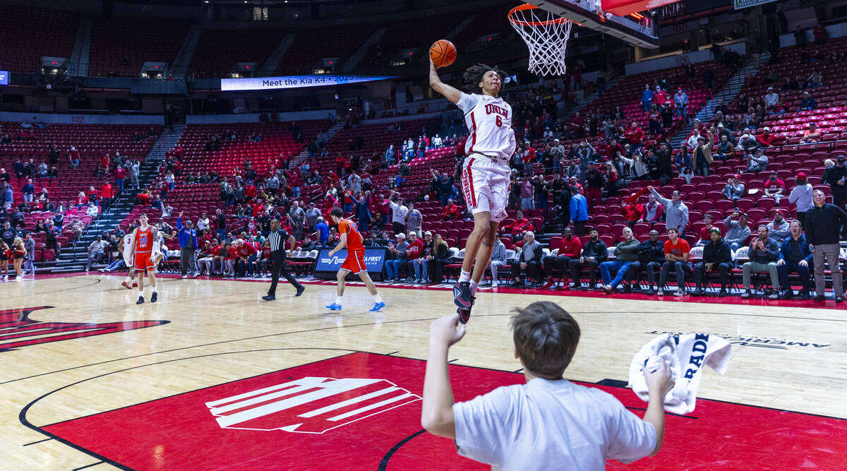 UNLV forward Tyrin Jones (6) finishes the game off with a final dunk as they defeat the Boise S ...