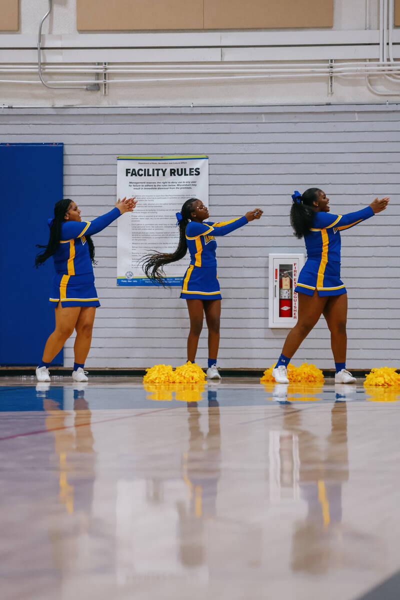 Democracy Prep cheerleaders cheer for the Blue Knights during the basketball game on Wednesday, ...