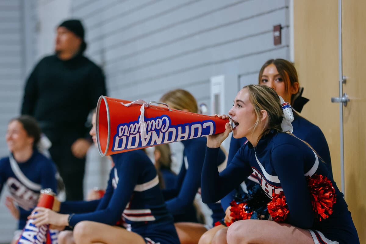 Coronado cheerleaders yell to try and distract Democracy Prep during a free throw at the basket ...