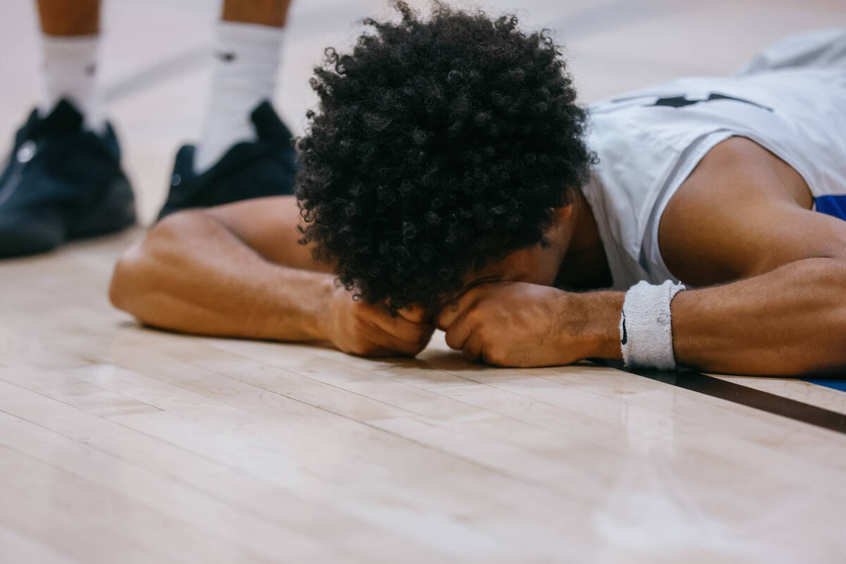 Democracy Prep guard Mario Allen (12) reacts after a foul was called against him during the bas ...