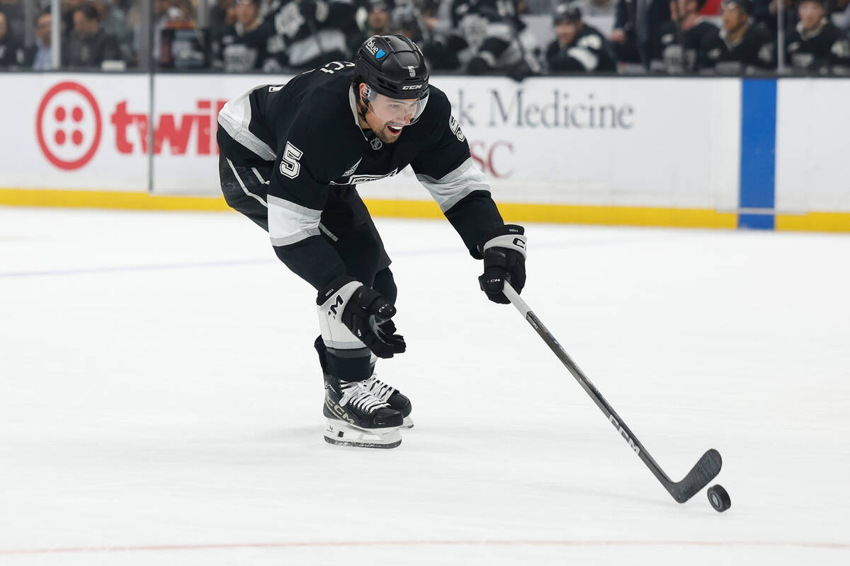Los Angeles Kings defenseman Cody Ceci (5) reaches for the puck during the first period of an N ...