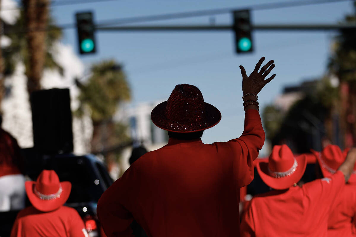 Members of the Red Hat Soul Sisters wave to the crowd during the Dr. Martin Luther King Jr. par ...