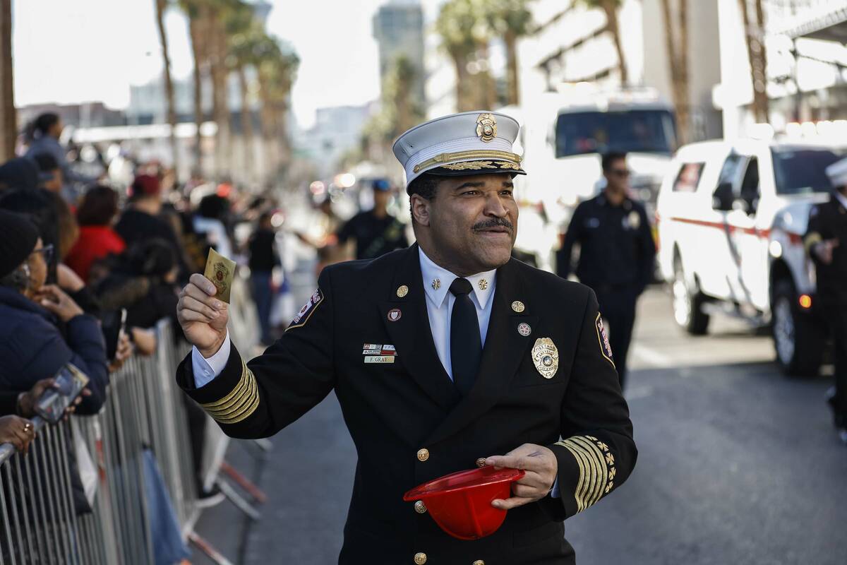 Fernando Gray, Chief of Las Vegas Fire & Rescue, hands out stickers during the Dr. Martin Luthe ...
