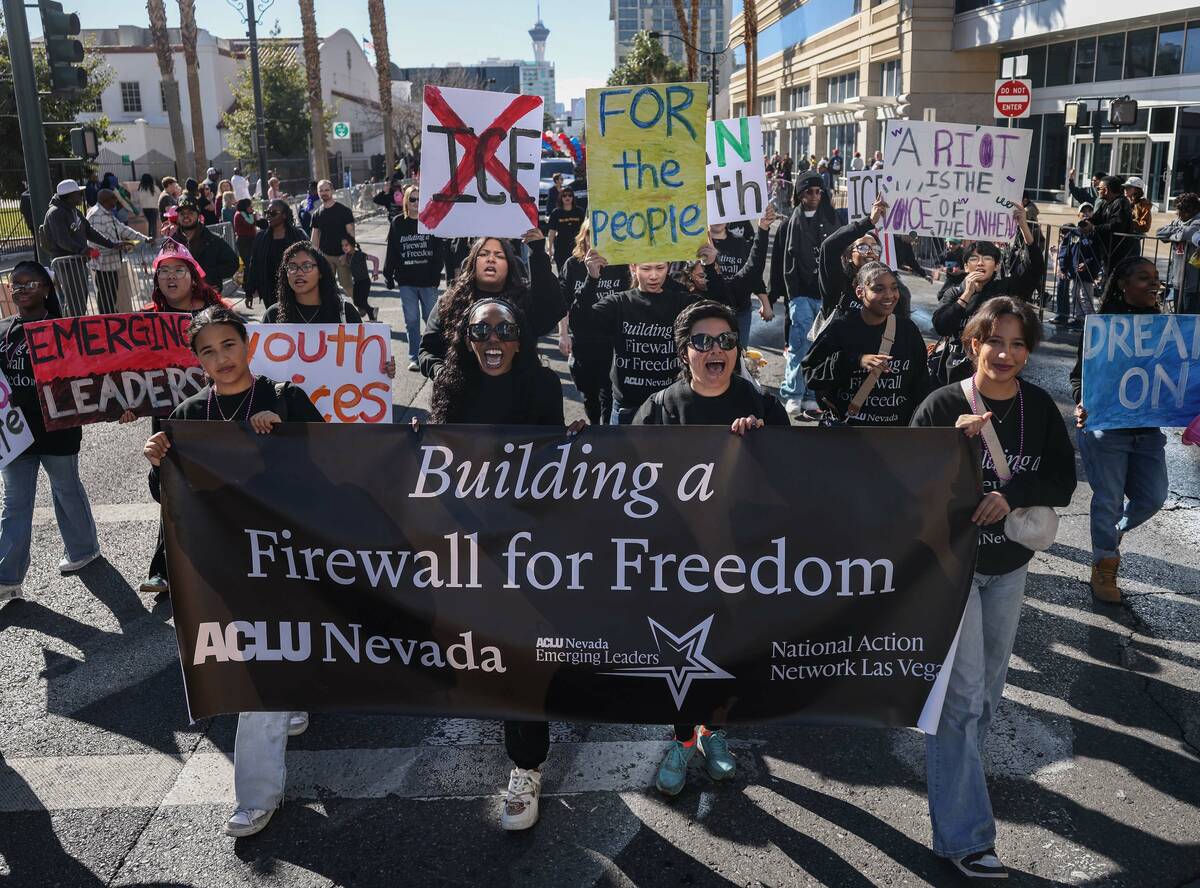 Members of the ACLU Nevada walk in the Dr. Martin Luther King Jr. parade Monday Jan. 19, 2026, ...
