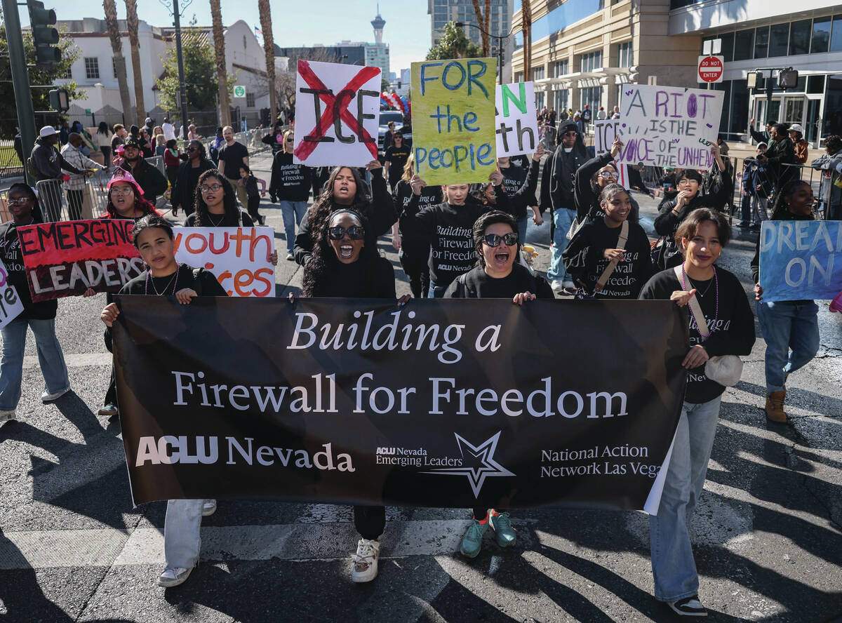 Members of the ACLU Nevada walk in the Dr. Martin Luther King Jr. parade Monday Jan. 19, 2026, ...