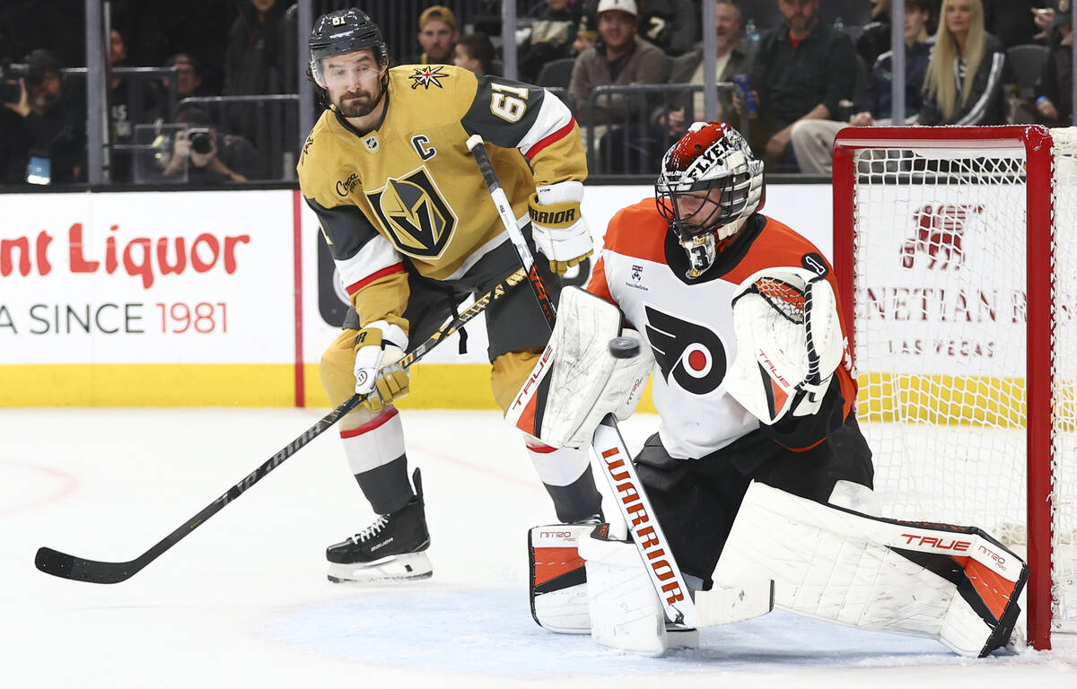 Philadelphia Flyers goaltender Samuel Ersson (33) blocks the puck as Golden Knights right wing ...