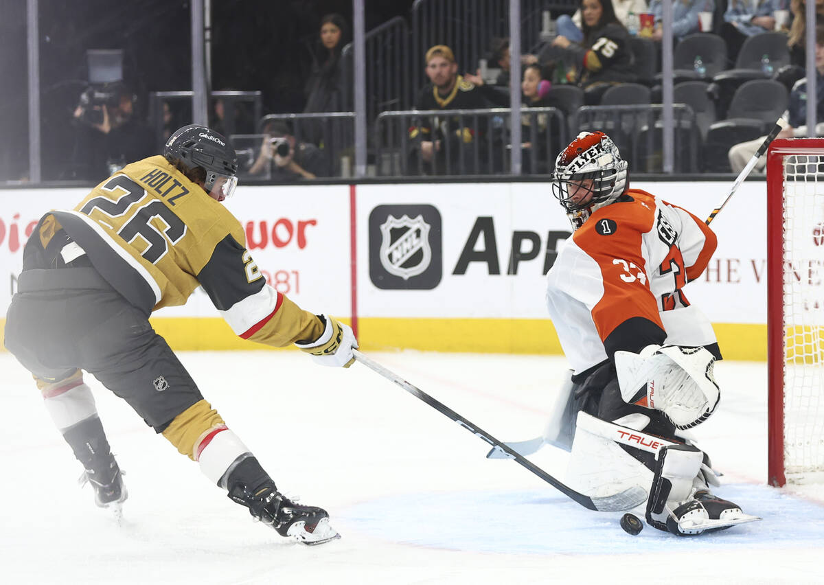 Philadelphia Flyers goaltender Samuel Ersson (33) blocks the shot of Golden Knights right wing ...