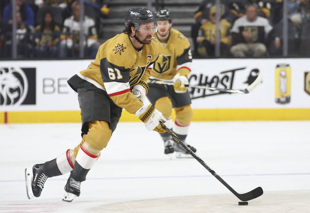 Golden Knights right wing Mark Stone (61) skates with the puck during the first period of an NH ...
