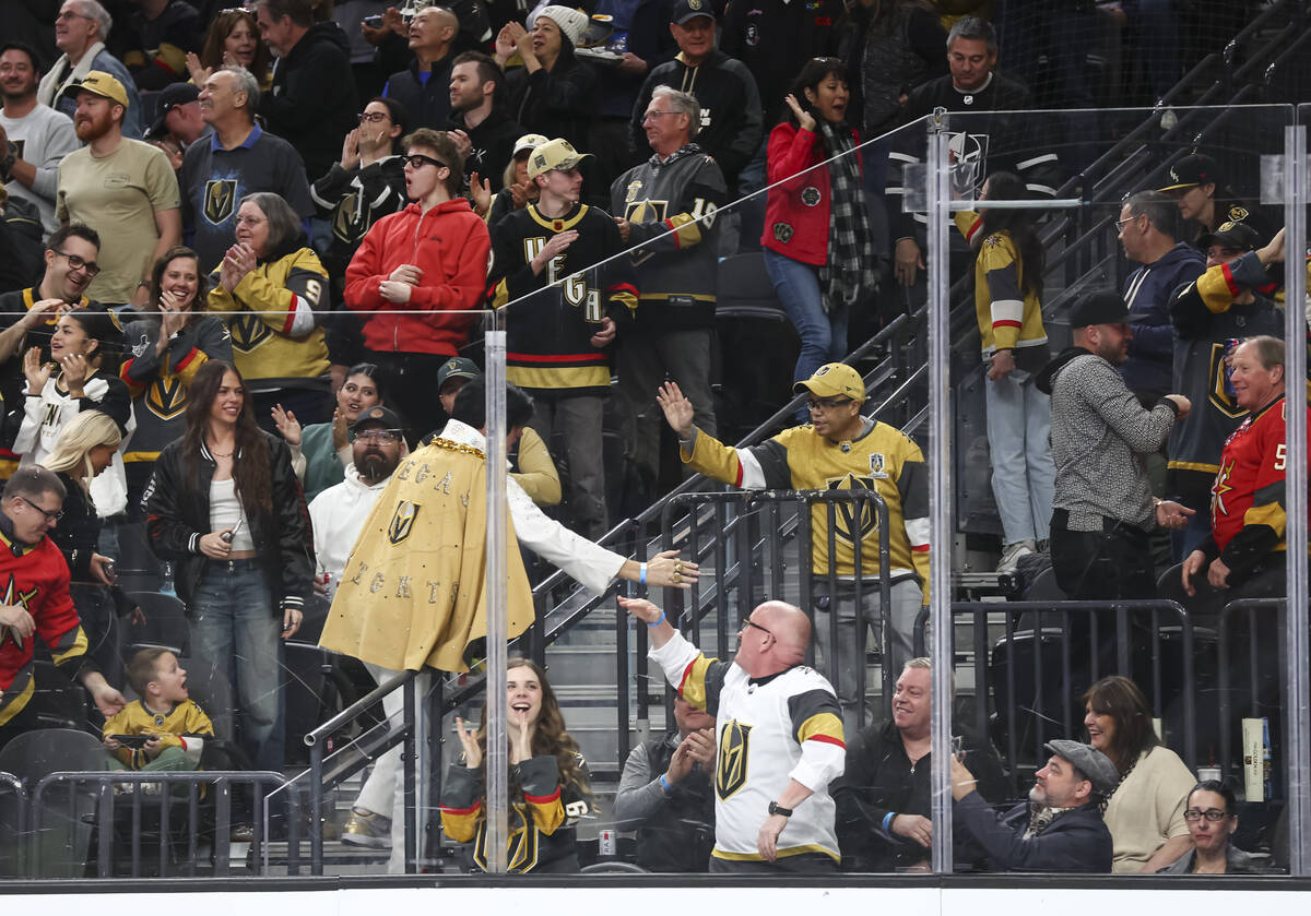 Golden Knights fans celebrate a goal against the Philadelphia Flyers during the second period o ...