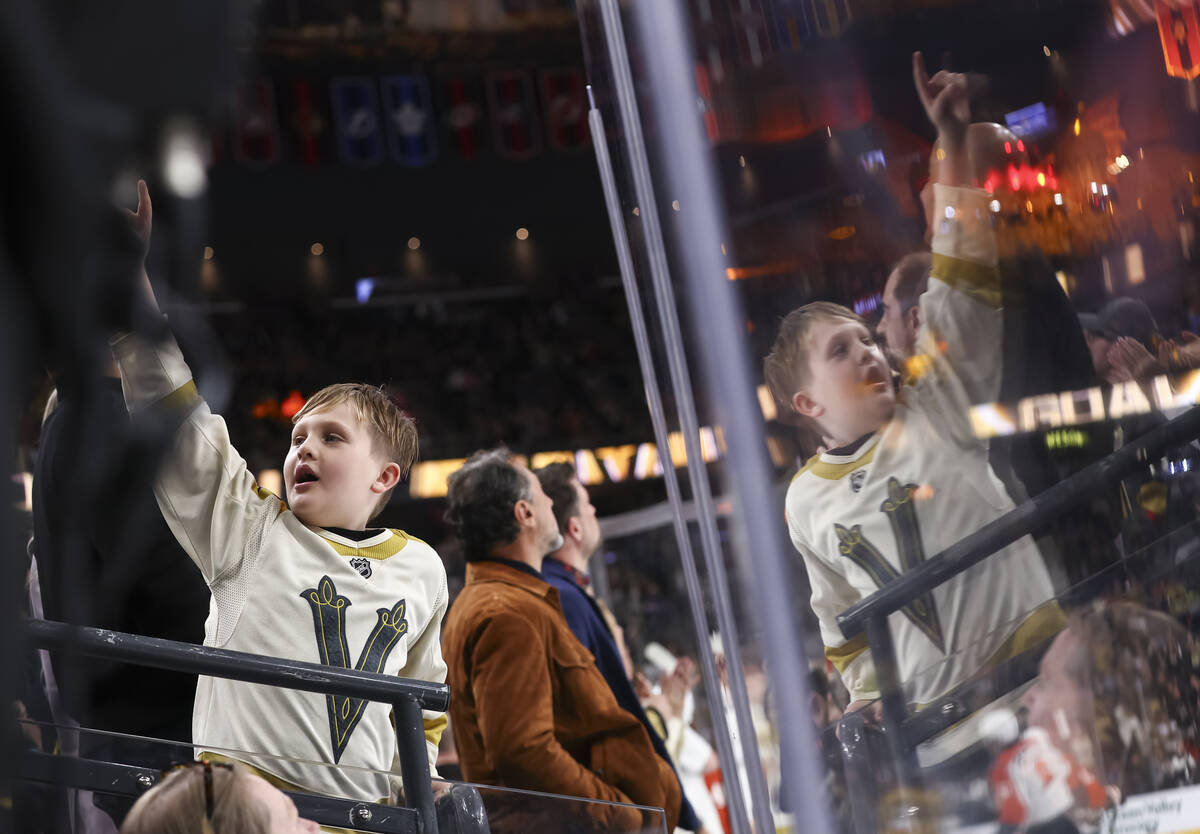 Golden Knights fans celebrate a goal against the Philadelphia Flyers during the second period o ...