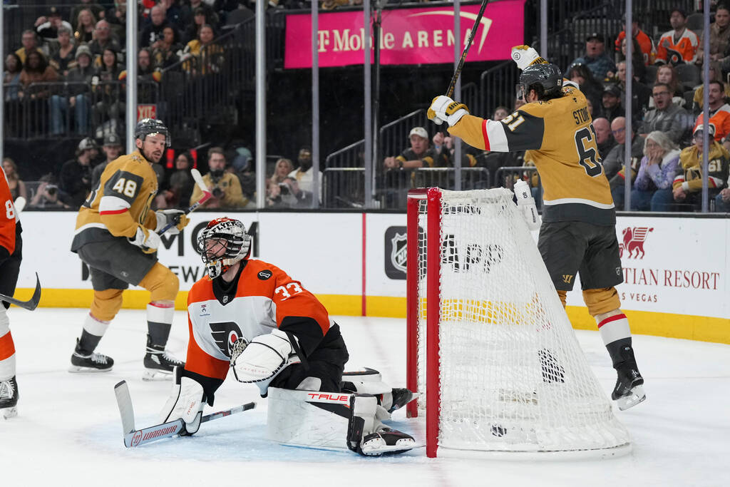 Philadelphia Flyers goaltender Samuel Ersson (33) is scored against by Vegas Golden Knights cen ...
