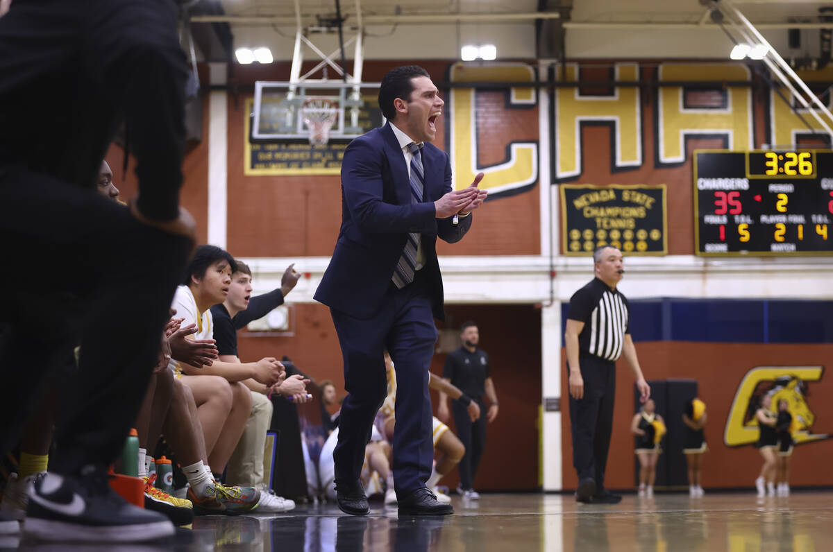 Clark head coach Brent Rothman reacts during a basketball game against Faith Lutheran at Clark ...