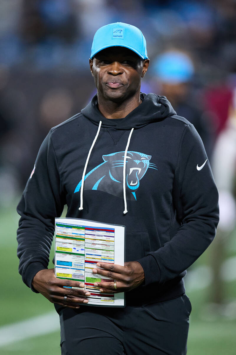 Carolina Panthers defensive coordinator Ejiro Evero walks off the field following an NFL wild c ...